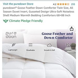 Down comforter, twin size. New in box.